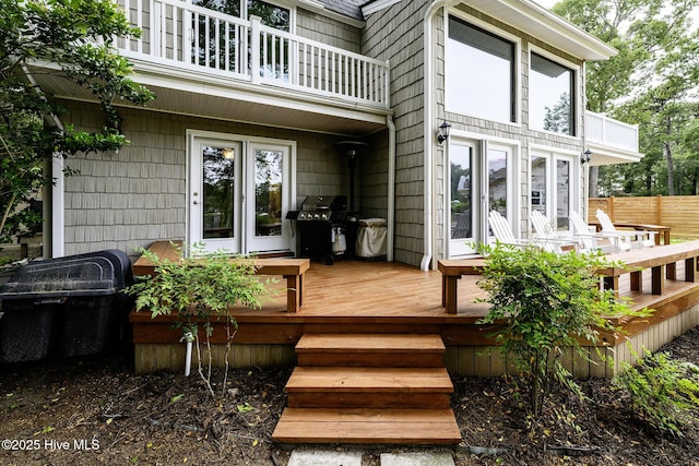 302 Plantation Dr, New Bern, NC 28562 - view of exterior entry featuring a balcony and a wooden deck
