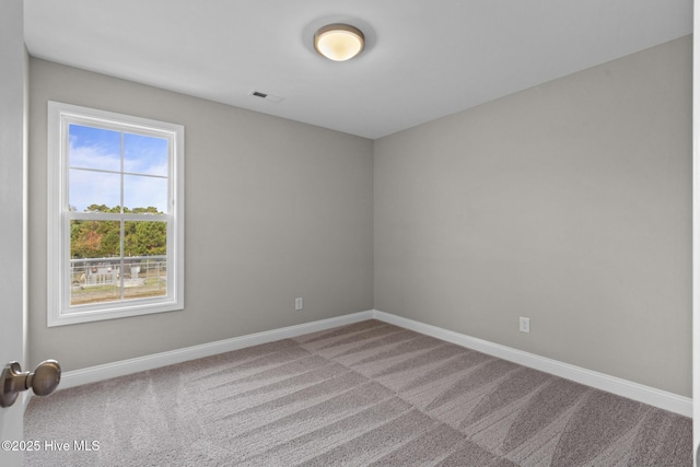 206 Ethan Pl, Hubert, NC 28539 - carpeted empty room with baseboards