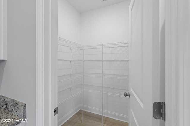 206 Ethan Pl, Hubert, NC 28539 - bathroom with wood finished floors and baseboards