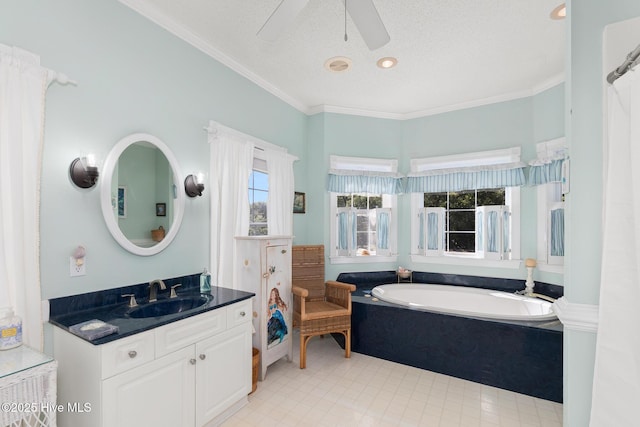 109 Lobster Ln, Emerald Isle, NC 28594 - bathroom with a garden tub, vanity, crown molding, and a ceiling fan