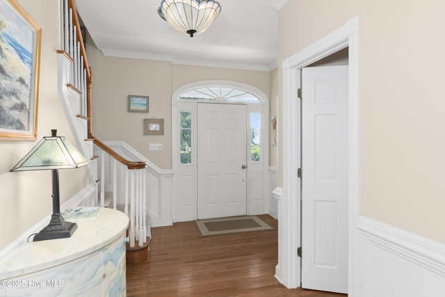 109 Lobster Ln, Emerald Isle, NC 28594 - entryway featuring stairs, dark wood-style flooring, and crown molding