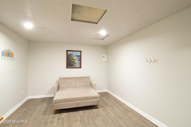 109 Lobster Ln, Emerald Isle, NC 28594 - living area featuring a paneled ceiling and wood finished floors