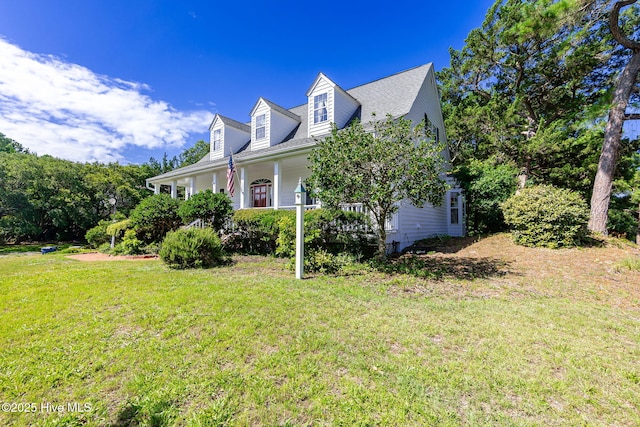 109 Lobster Ln, Emerald Isle, NC 28594 - view of front of house with a front lawn and covered porch