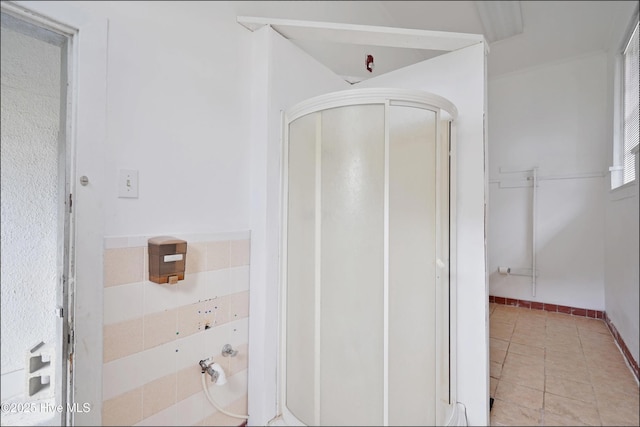 9291 NC-171, Williamston, NC 27892 - bathroom featuring tile patterned floors and a stall shower