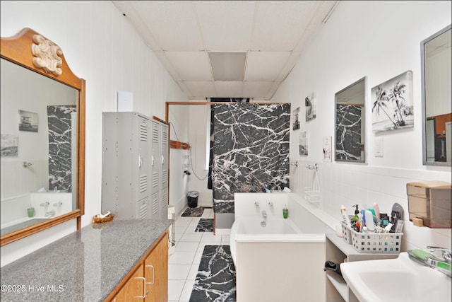 9291 NC-171, Williamston, NC 27892 - full bath featuring a sink, a drop ceiling, tile patterned floors, a stall shower, and tile walls