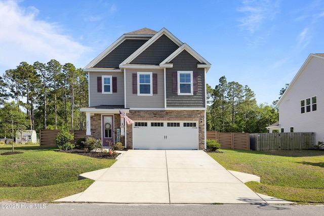 221 Salt Meadow Ln, Newport, NC 28570 - craftsman inspired home with concrete driveway, a garage, and stone siding