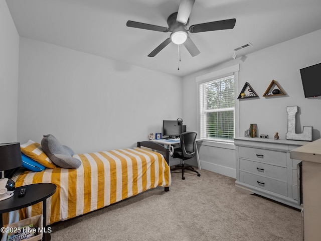221 Salt Meadow Ln, Newport, NC 28570 - bedroom featuring light carpet, a desk, a ceiling fan, and baseboards