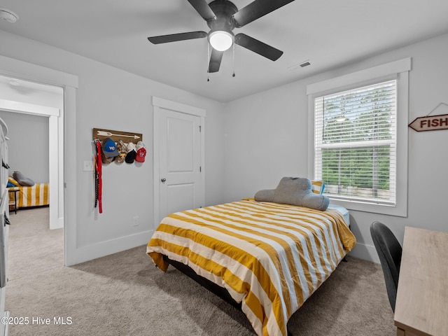 221 Salt Meadow Ln, Newport, NC 28570 - bedroom featuring carpet flooring, baseboards, and ceiling fan