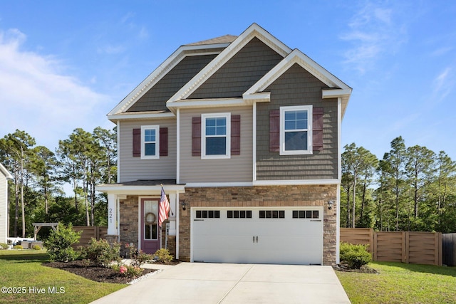 221 Salt Meadow Ln, Newport, NC 28570 - craftsman-style house with stone siding, driveway, and an attached garage