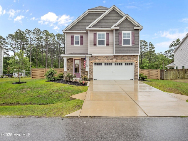 221 Salt Meadow Ln, Newport, NC 28570 - craftsman house with stone siding, a garage, and concrete driveway