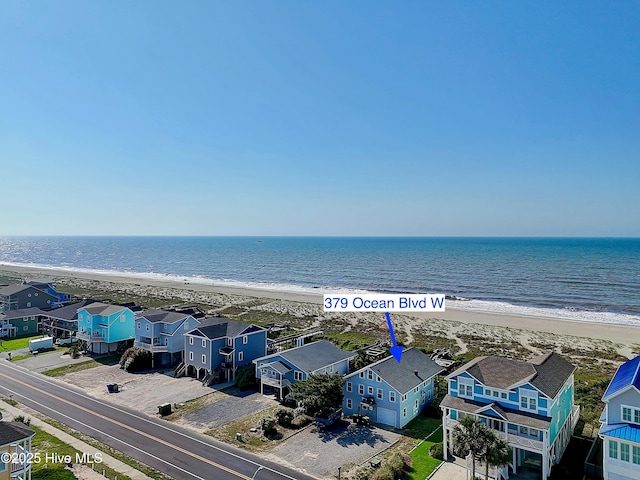 379 Ocean Blvd W, Holden Beach, NC 28462 - aerial perspective of suburban area with expansive coastline