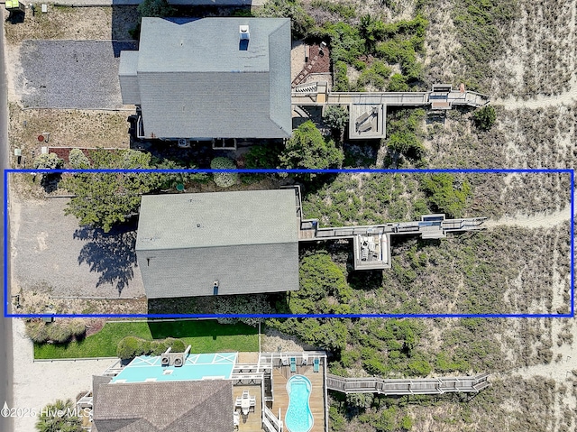 379 Ocean Blvd W, Holden Beach, NC 28462 - aerial overview of property's location with property boundaries highlighted and a pool area