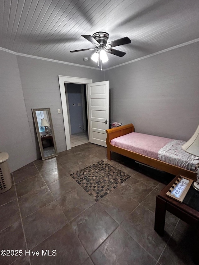 bedroom with crown molding, tile patterned floors, and ceiling fan