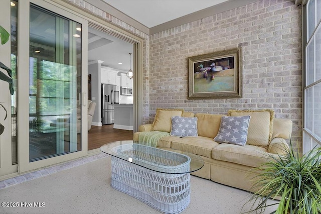 697 Jenoa Loop, Castle Hayne, NC 28429 - living area with brick wall