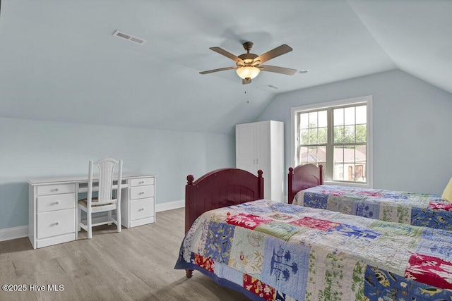 697 Jenoa Loop, Castle Hayne, NC 28429 - bedroom featuring lofted ceiling, wood finished floors, ceiling fan, and baseboards