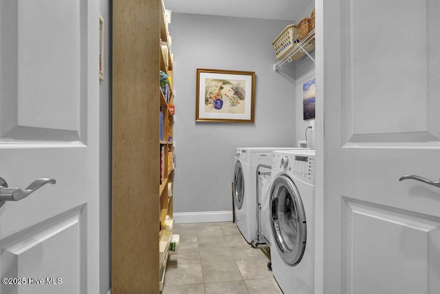 697 Jenoa Loop, Castle Hayne, NC 28429 - washroom featuring washing machine and clothes dryer and baseboards