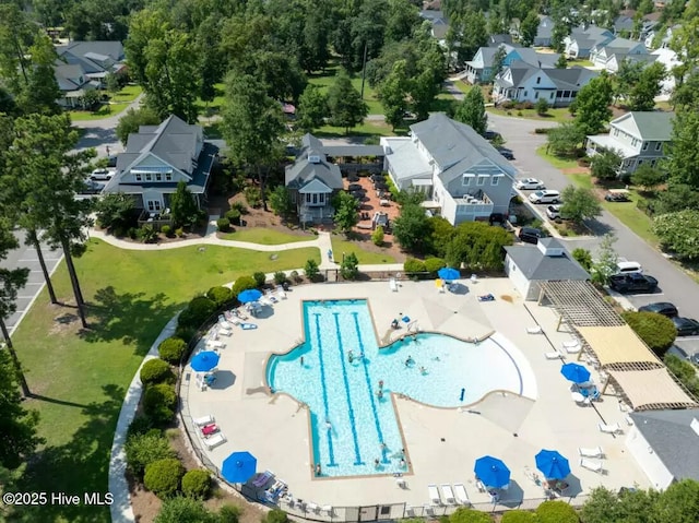 697 Jenoa Loop, Castle Hayne, NC 28429 - aerial perspective of suburban area featuring a pool area