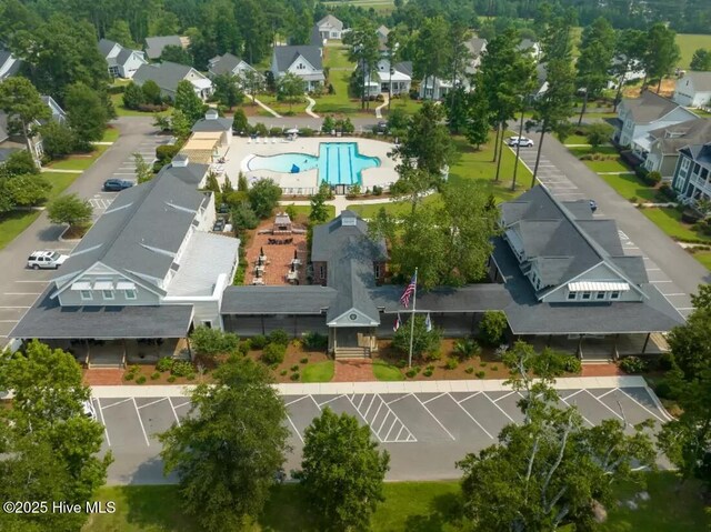 697 Jenoa Loop, Castle Hayne, NC 28429 - aerial perspective of suburban area featuring a pool