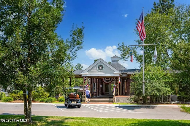 697 Jenoa Loop, Castle Hayne, NC 28429 - view of property featuring uncovered parking