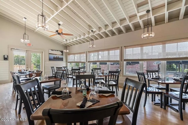 697 Jenoa Loop, Castle Hayne, NC 28429 - dining area featuring wood finished floors, healthy amount of natural light, ceiling fan, high vaulted ceiling, and beam ceiling