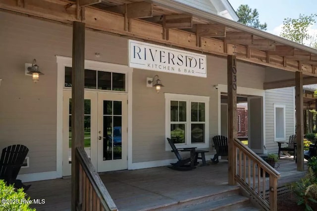 697 Jenoa Loop, Castle Hayne, NC 28429 - view of exterior entry featuring french doors