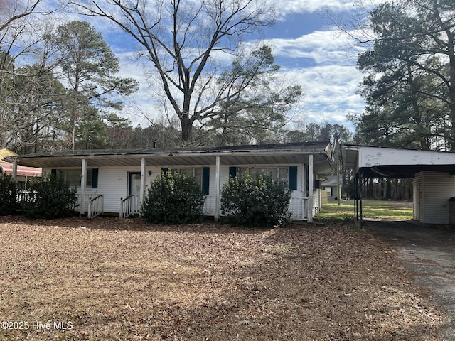 144 Shannonhouse Rd, Edenton, NC 27932 - view of front of home with an attached carport, driveway, and a porch
