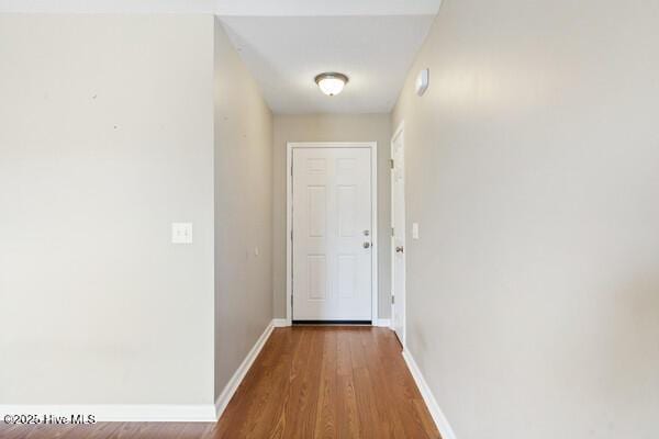 2610 Selkirk Ct, Wilmington, NC 28411 - doorway to outside with wood finished floors and baseboards