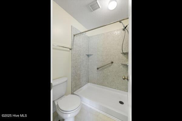 2610 Selkirk Ct, Wilmington, NC 28411 - full bathroom with toilet and tiled shower