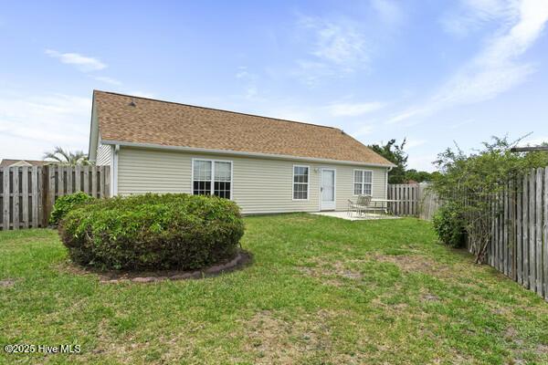 2610 Selkirk Ct, Wilmington, NC 28411 - rear view of property with a patio