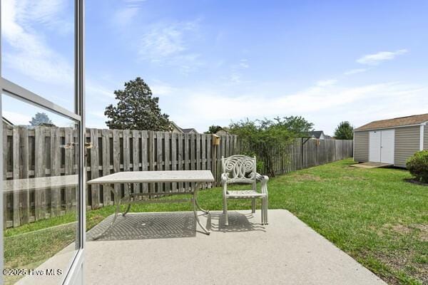2610 Selkirk Ct, Wilmington, NC 28411 - view of patio with a storage shed and an outdoor structure