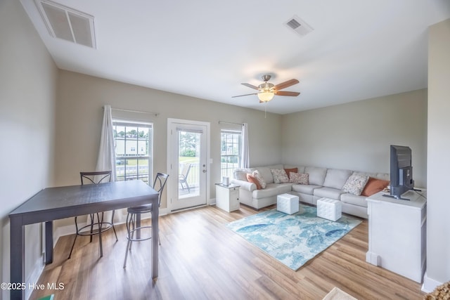 200 Twin Oaks Dr Unit B, Hampstead, NC 28443 - living room with light wood-style floors and a ceiling fan