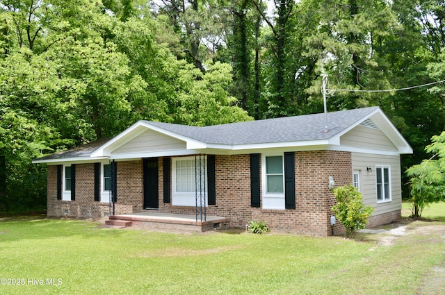 2692 Mt Herman Church Rd, Snow Hill, NC 28580 - ranch-style house with crawl space, a porch, a front yard, and brick siding