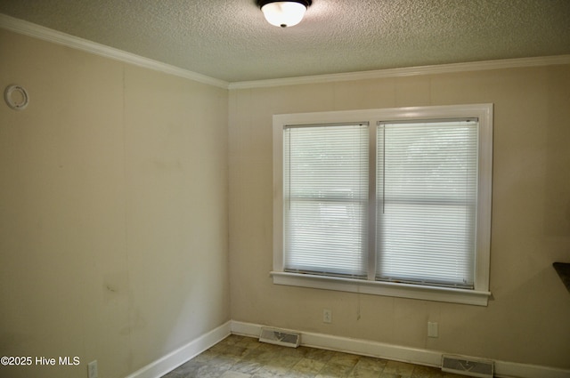 2692 Mt Herman Church Rd, Snow Hill, NC 28580 - empty room featuring ornamental molding, a textured ceiling, and baseboards
