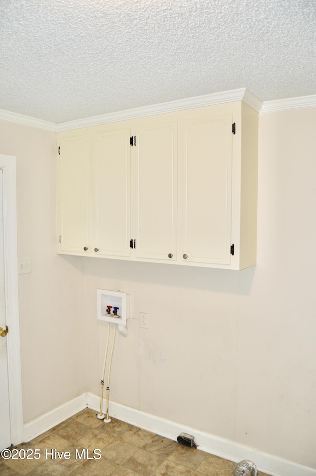 2692 Mt Herman Church Rd, Snow Hill, NC 28580 - washroom featuring cabinet space, a textured ceiling, hookup for a washing machine, baseboards, and ornamental molding