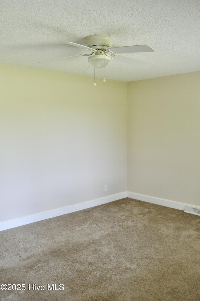 2692 Mt Herman Church Rd, Snow Hill, NC 28580 - unfurnished room with a ceiling fan, carpet, baseboards, and a textured ceiling