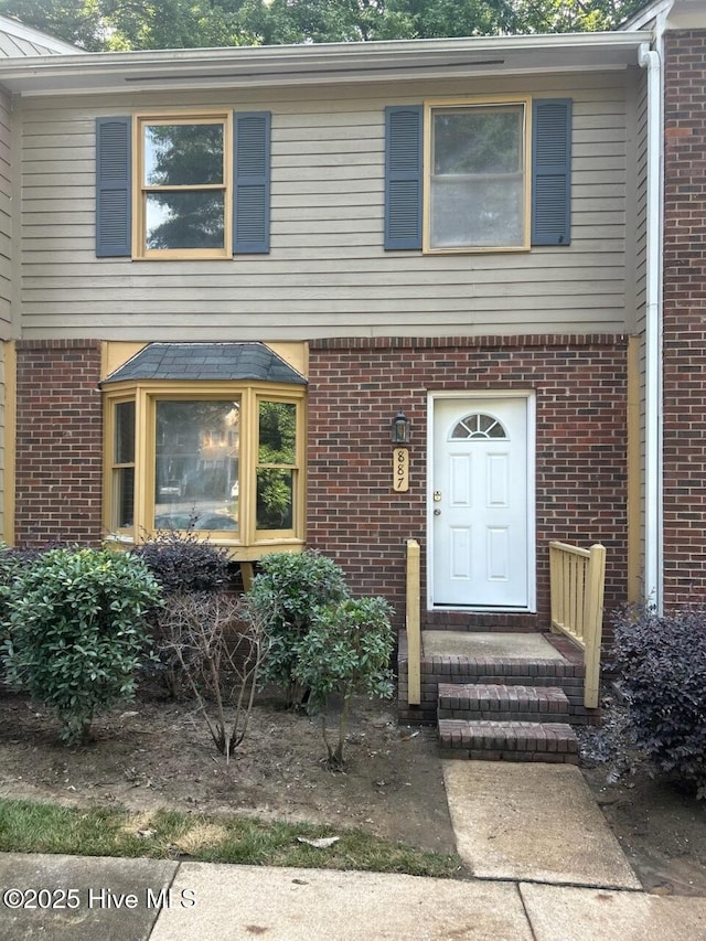 887 Dalewood Dr, Raleigh, NC 27610 - view of front of home featuring brick siding