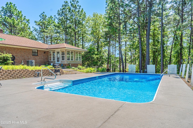 118 Lancashire Ln, West End, NC 27376 - view of swimming pool with a patio and central AC