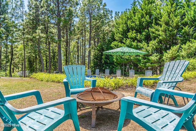 118 Lancashire Ln, West End, NC 27376 - view of patio featuring an outdoor fire pit