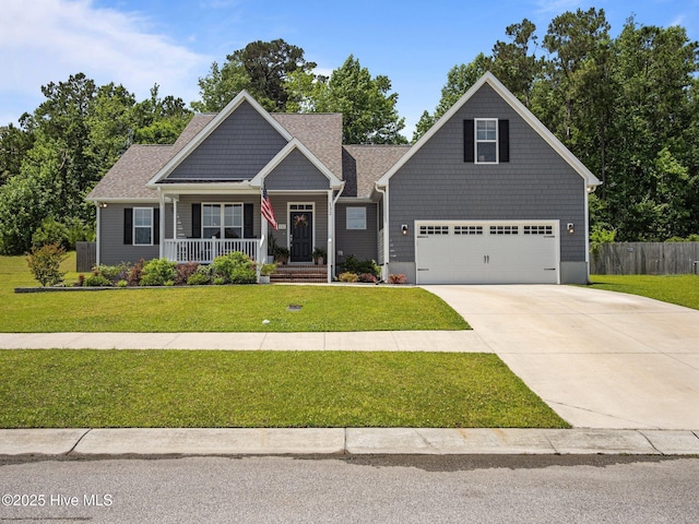 craftsman inspired home with a porch, concrete driveway, and an attached garage