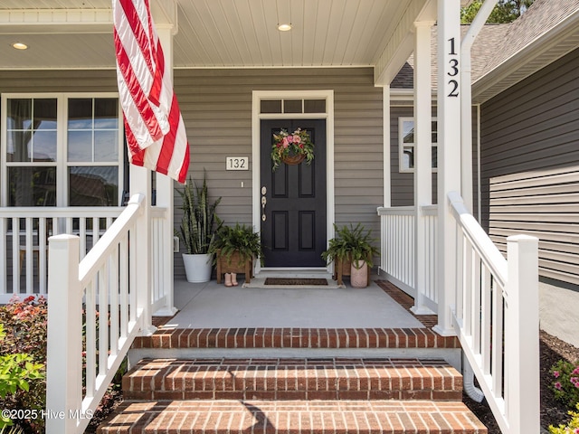 entrance to property with covered porch