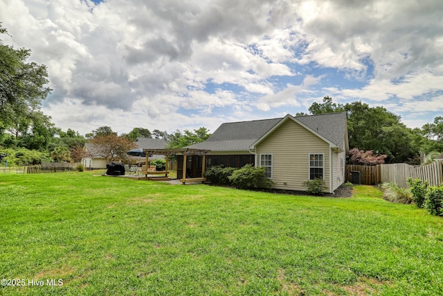 rear view of property with roof with shingles