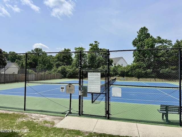 314 Gaskins Ln, Wilmington, NC 28411 - view of tennis court with a gate and fence