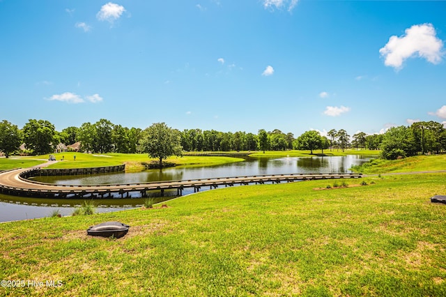 water view with a tree filled landscape