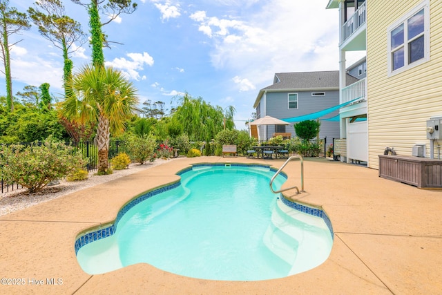 104 SE 32nd St, Oak Island, NC 28465 - view of pool with a patio and fence