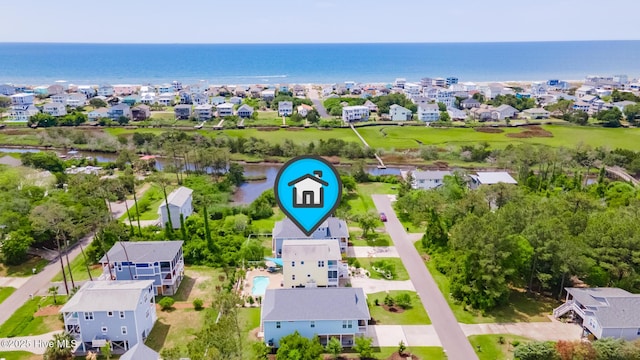104 SE 32nd St, Oak Island, NC 28465 - aerial view of residential area featuring a nearby body of water