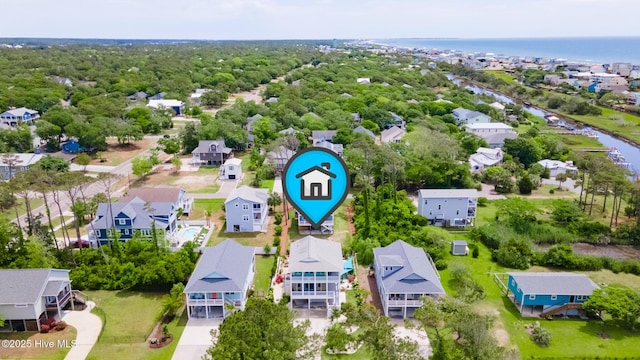 104 SE 32nd St, Oak Island, NC 28465 - aerial view of residential area featuring a large body of water