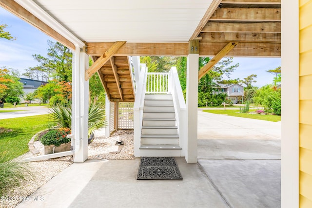 104 SE 32nd St, Oak Island, NC 28465 - view of patio featuring stairway