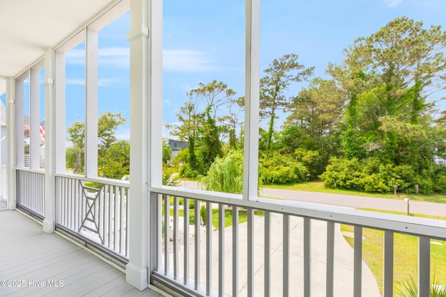 104 SE 32nd St, Oak Island, NC 28465 - unfurnished sunroom featuring healthy amount of natural light