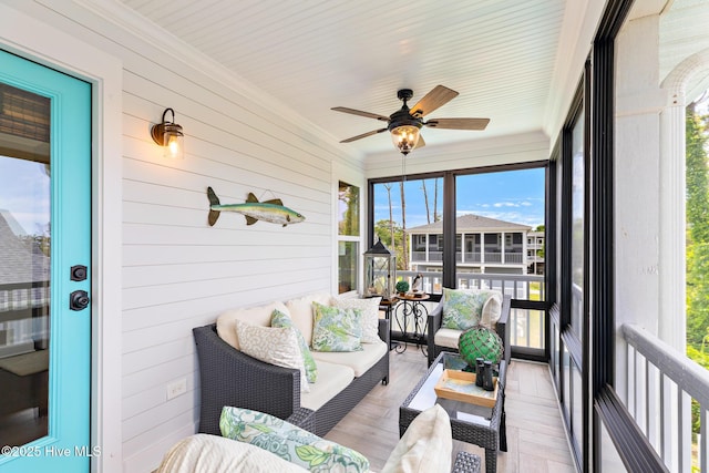 104 SE 32nd St, Oak Island, NC 28465 - sunroom with an outdoor living space, a ceiling fan, and plenty of natural light