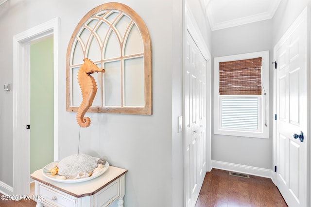 104 SE 32nd St, Oak Island, NC 28465 - corridor with crown molding, baseboards, and dark wood-style flooring